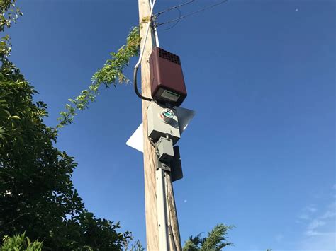 what is large metal box on telephone pole|strange boxes on utility poles.